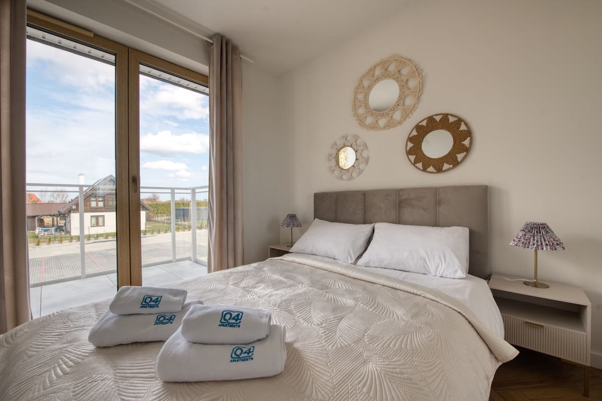 Apartment, 2 Bedrooms, Garden View | Laptop workspace, blackout drapes, iron/ironing board, free WiFi
