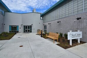 A building with a sign reading "Sea Colony Freeman Fitness Center" and a bench in front. - 3 Bedroom, 2.5 Bath, Sea Colony Oceanfront Condo! (Bethany Beach)