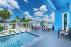 A heated pool - 🏊 🏖️ Shore Bet: Luxury 4BR, Private Pool + Short Walk to Fort Myers Beach! (Fort Myers Beach)