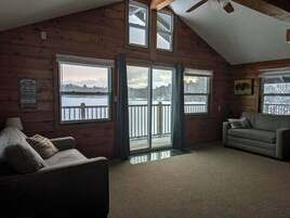 Basic Cabin, Balcony, Lake View | Living area