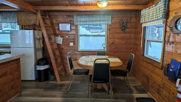 Basic Cabin, Balcony, Lake View | Dining
