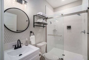 Regadera y shampoo 