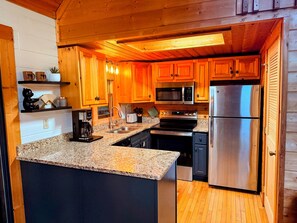 Fridge, microwave, oven, stovetop - Luxe Cabin w/ 2 King Suites, Hot Tub, & Firepit (Sevierville)