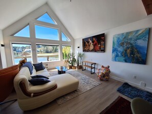 Living area - New Penthouse over the water, incredible views of marina and boats, (Ucluelet)