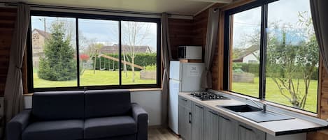 Fridge, microwave, stovetop, coffee/tea maker