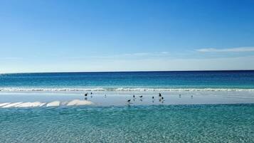 On the beach, sun loungers