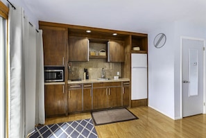 Fridge, microwave, stovetop, coffee/tea maker