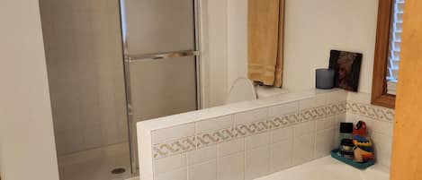 Shower, hair dryer, towels, soap