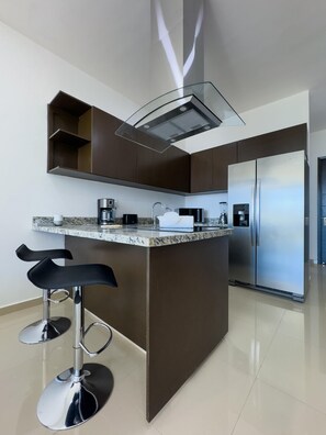 Fridge, microwave, stovetop, coffee/tea maker - Golden Zone Escape: Stylish New Condo Steps from the Beach & Everything You Love (Mazatlan)