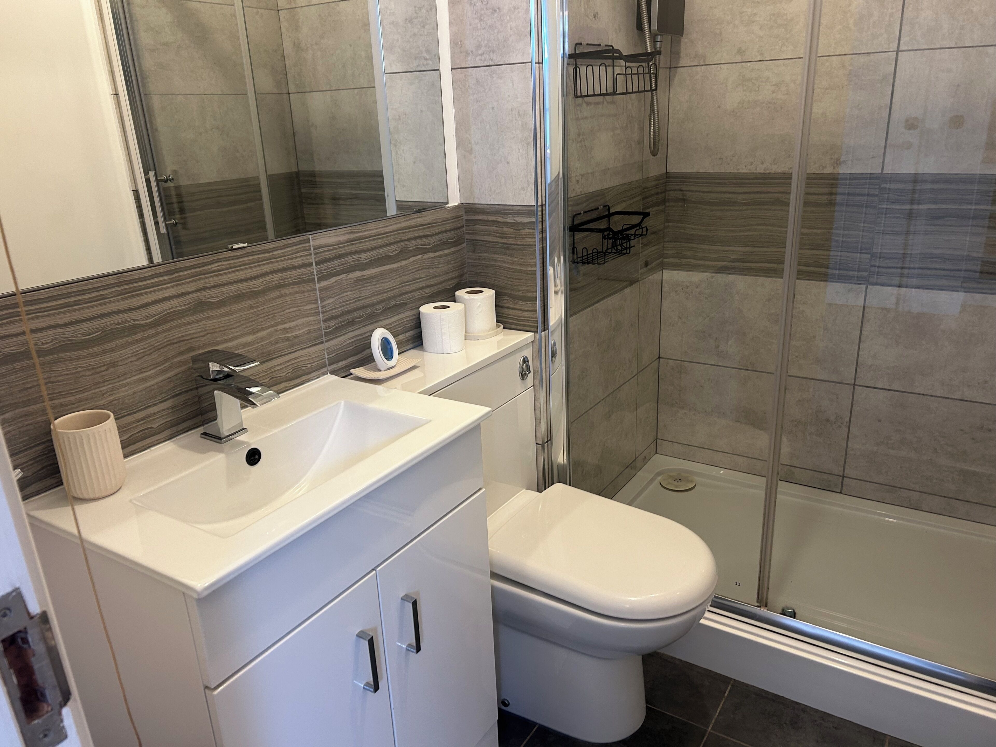 Shower, towels, toilet paper