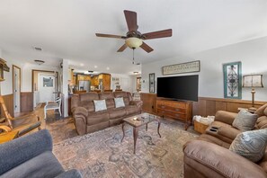 TV, fireplace, books, offices
