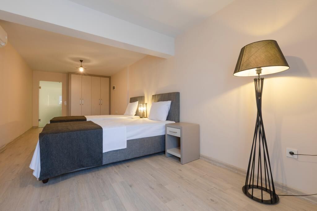 Deluxe driepersoonskamer, balkon, uitzicht op zee | Gratis wifi