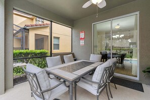 Outdoor dining - Spacious 6BR/5BA Paradise Palms Villa with Private Pool, Game Room & Resort Amenities - 5 Miles to Disney (Kissimmee)