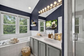 Shower, hair dryer, towels, shampoo