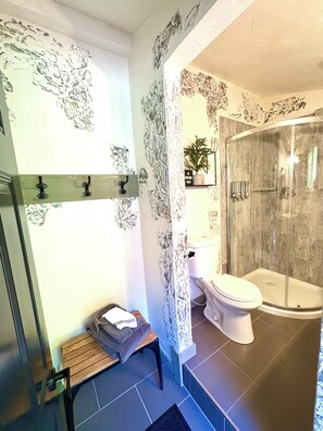 Shower, hair dryer, towels, soap