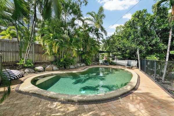 Cool off in the residents’ lagoon-style swimming pool, with day beds to relax in the sun.