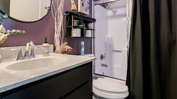 Hair dryer, towels, soap, toilet paper