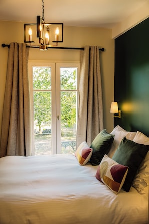 Deluxe-Doppelzimmer, Gartenblick | Zimmersafe, Bügeleisen/Bügelbrett, kostenloses WLAN