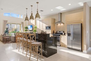 Fridge, microwave, oven, stovetop - Designer 4BR Getaway, Sleek Laminate Floors (Kissimmee)