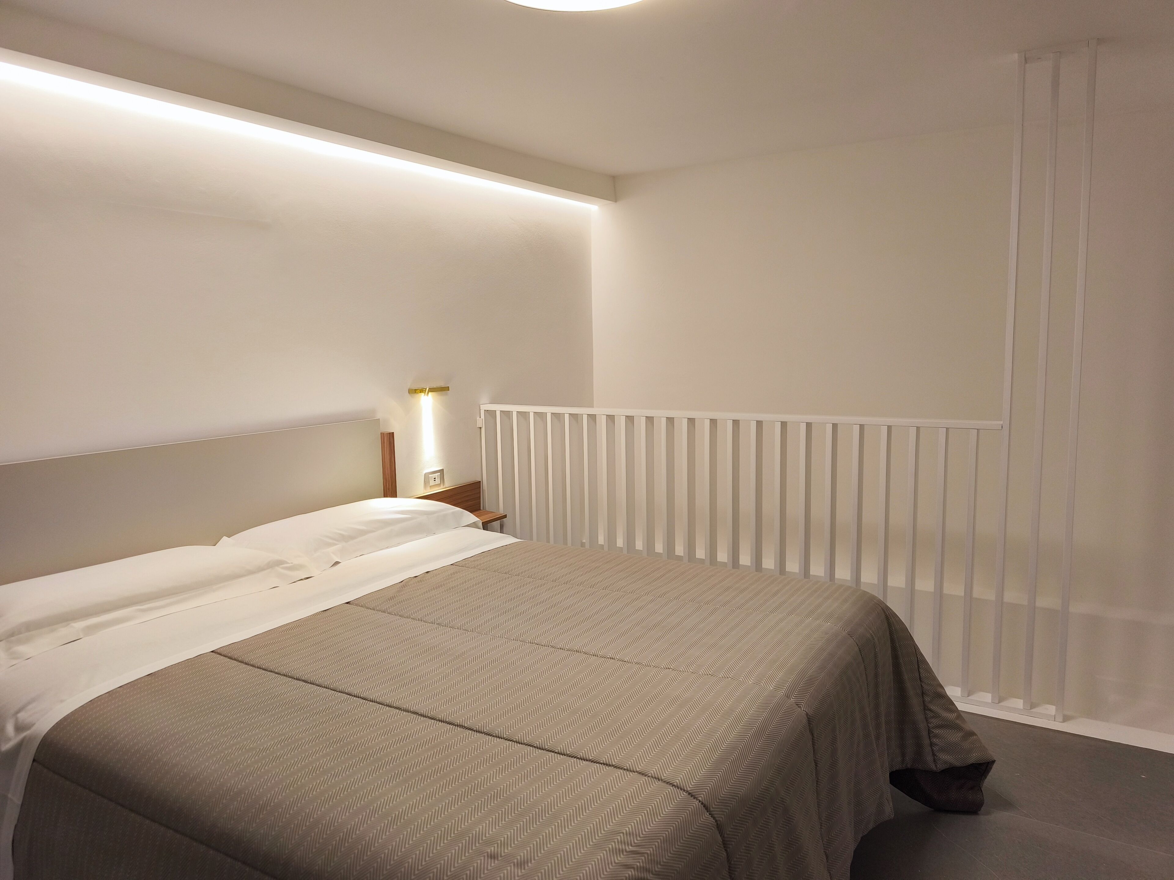 Deluxe Loft, Patio, Garden View | In-room safe, soundproofing, iron/ironing board, free WiFi