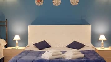 Basic Quadruple Room, Balcony, City View | In-room safe, soundproofing, iron/ironing board, free WiFi