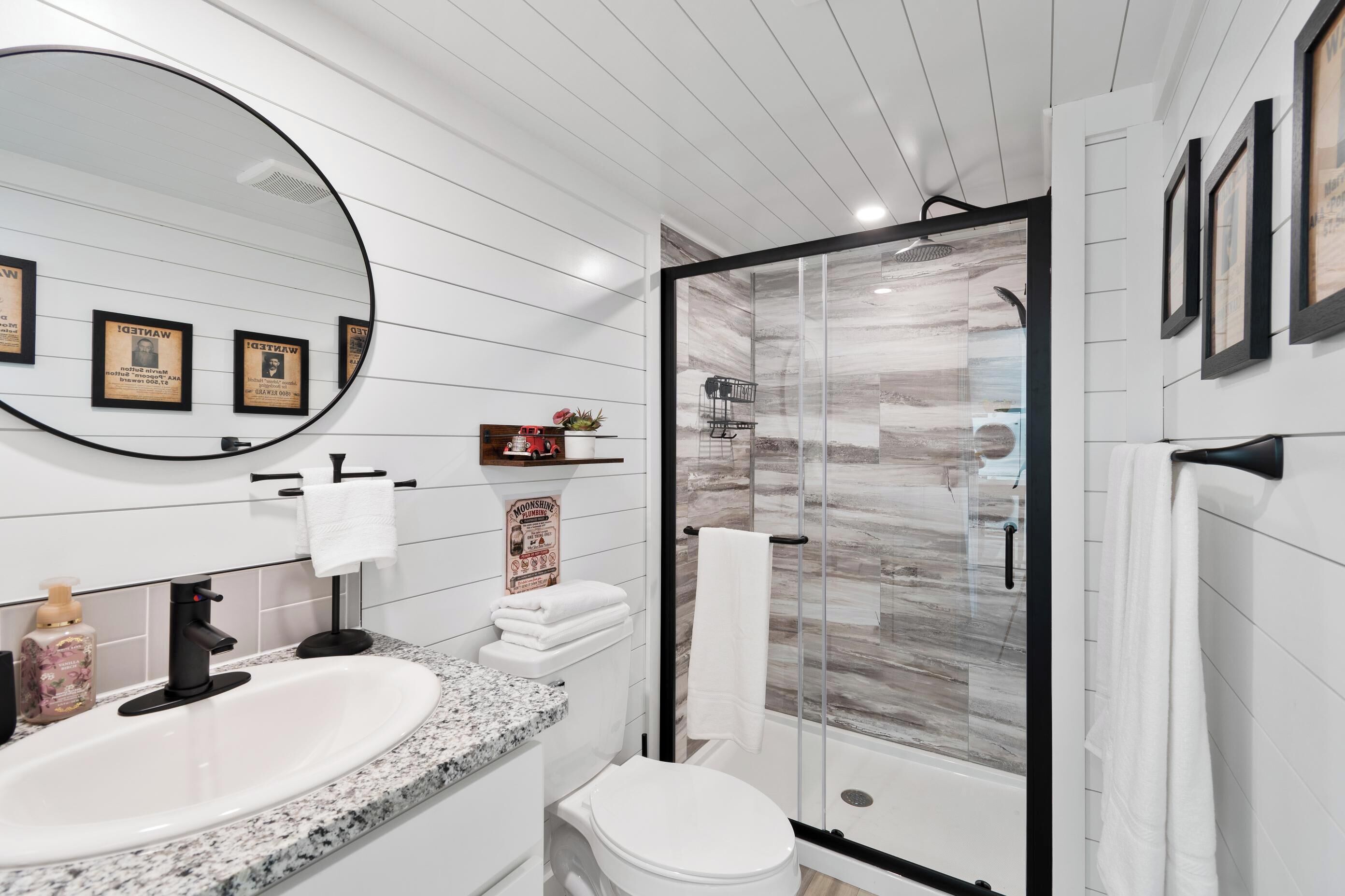 Shower, hair dryer, towels, shampoo