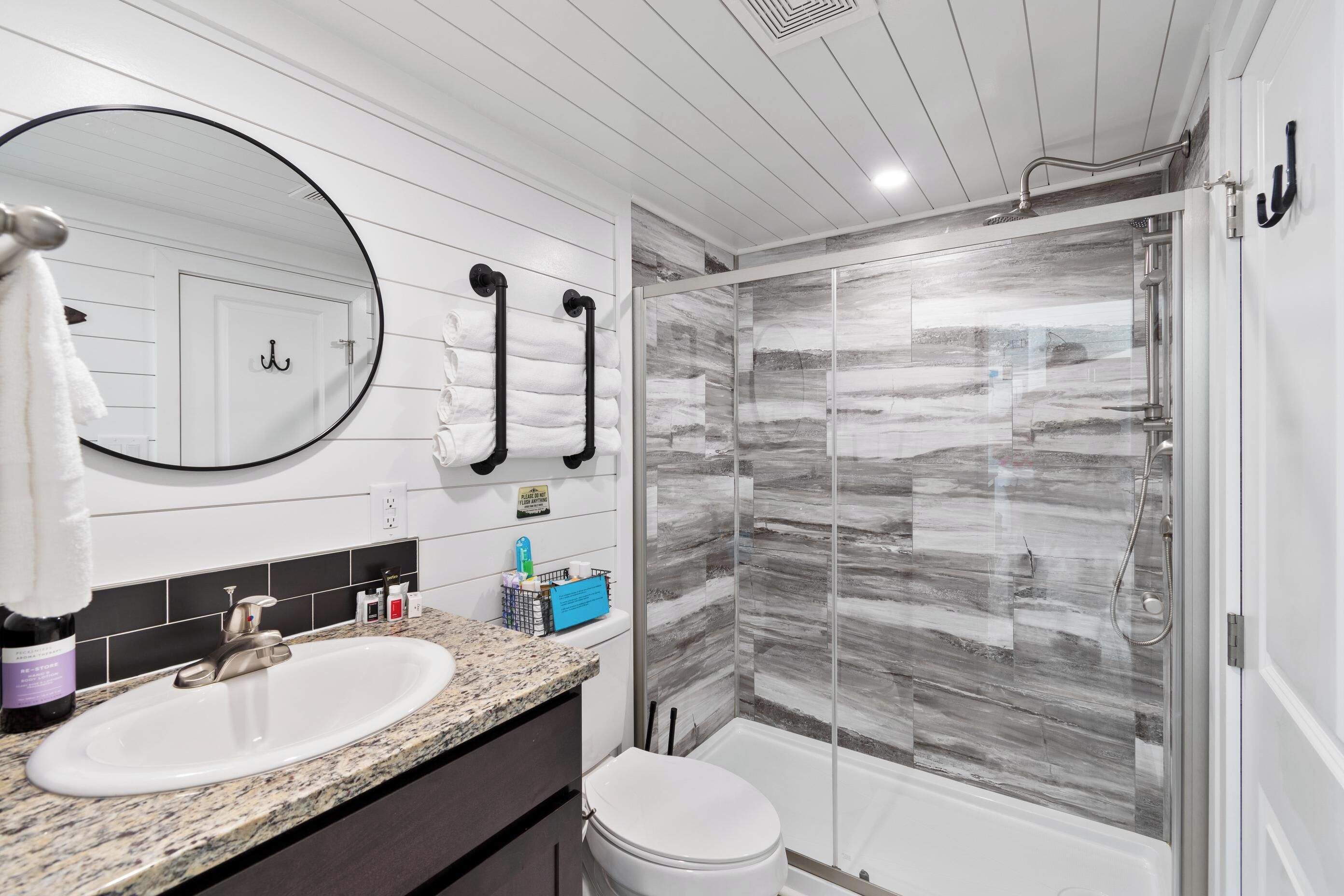 Shower, hair dryer, towels, shampoo