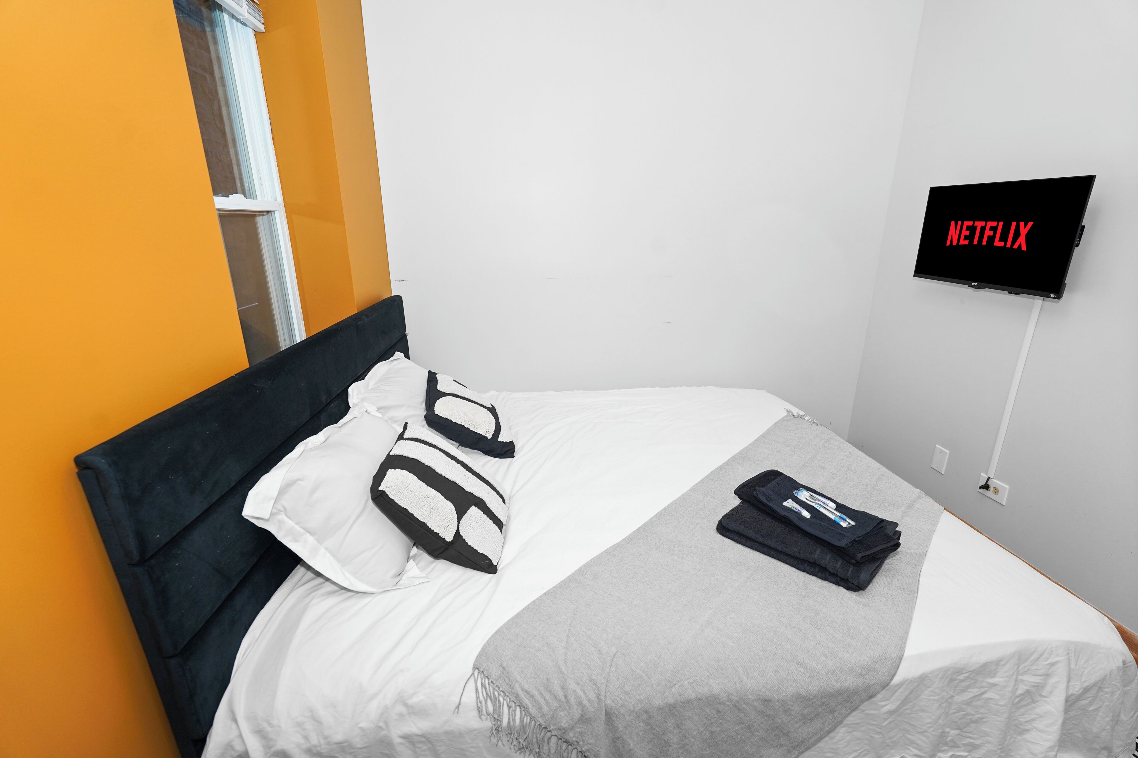 Iron/ironing board, travel crib, free WiFi, bed sheets