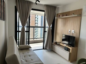 Apartemen Comfort, pemandangan pantai | Area keluarga