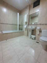 Hair dryer, towels, soap, shampoo