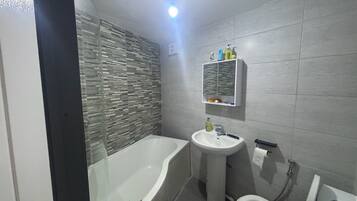 Hair dryer, towels, soap, toilet paper