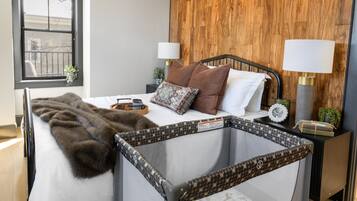 Iron/ironing board, travel crib, free WiFi, bed sheets