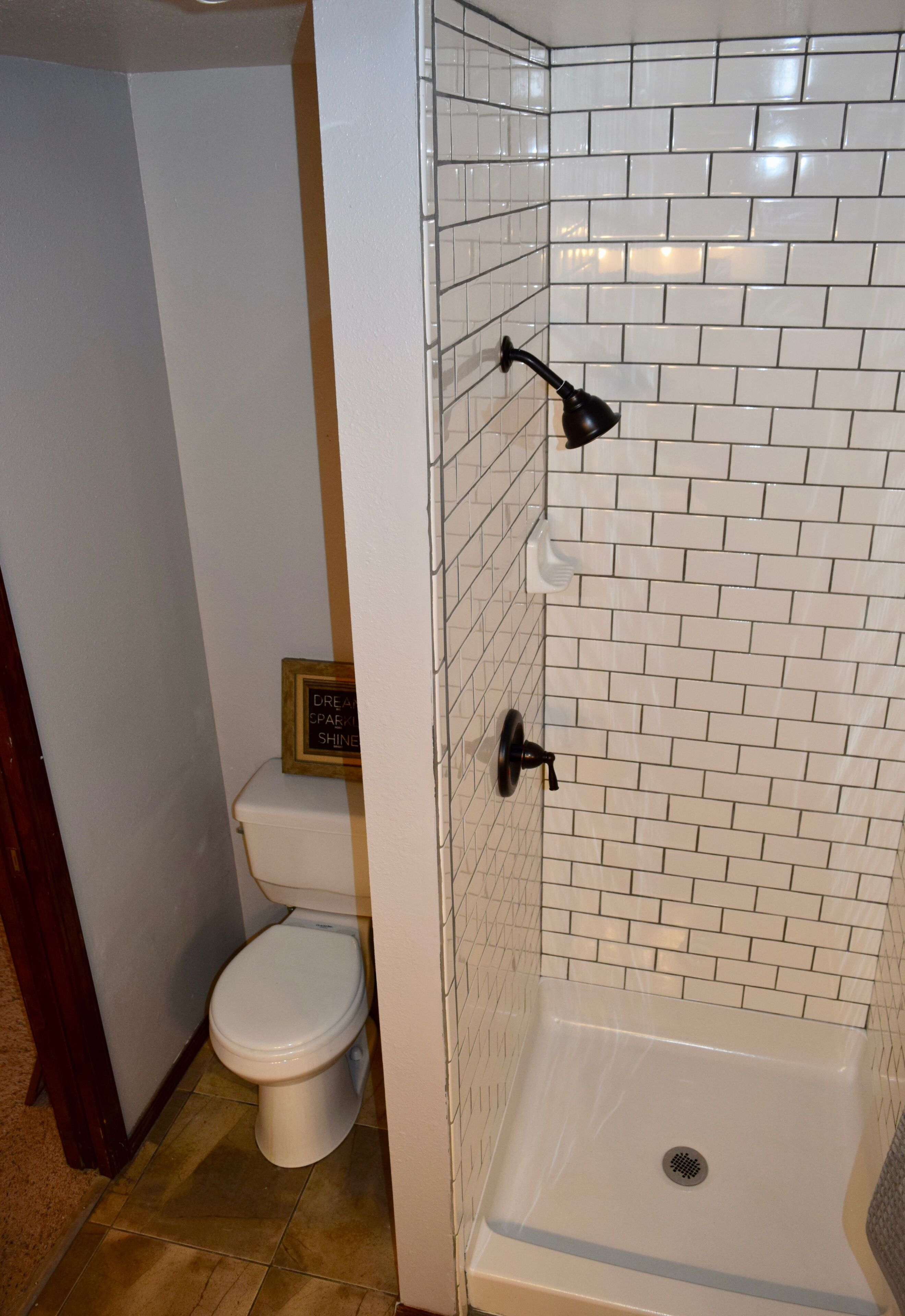Shower, towels, soap, toilet paper