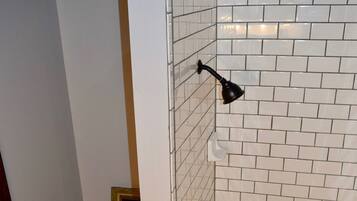 Shower, towels, soap, toilet paper