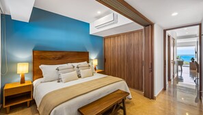 Comfortable bedroom with a king-size bed, soft linens, and calming tones designed for restful nights and relaxed mornings. - Oceanview - 1BR Condo at Harbor 171 | Beachfront, Rooftop Pool & Terrace (Puerto Vallarta)