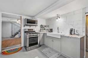 We provide kitchen basics for your use. - Cozy Private Basement Apartment in South Minneapolis - Cave Den (Minneapolis)
