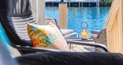 Waterfront Tiny House w Pool, Beach, and Boat Dock
