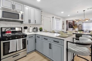 Fridge, microwave, oven, stovetop - Game Lover’s Getaway - 6BR Funhouse for Big Groups (North Las Vegas)