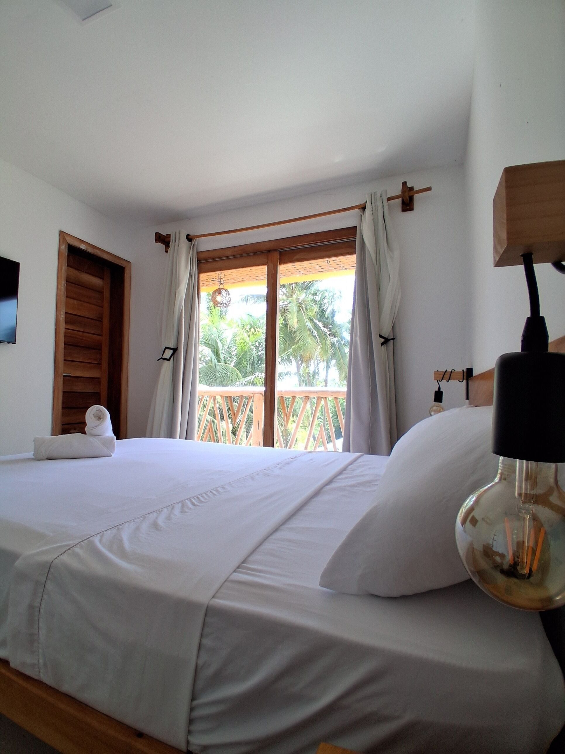 Suíte Tupinambá | Frigobar, Wi-Fi de cortesia, roupa de cama