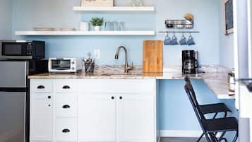 Fridge, microwave, coffee/tea maker, toaster
