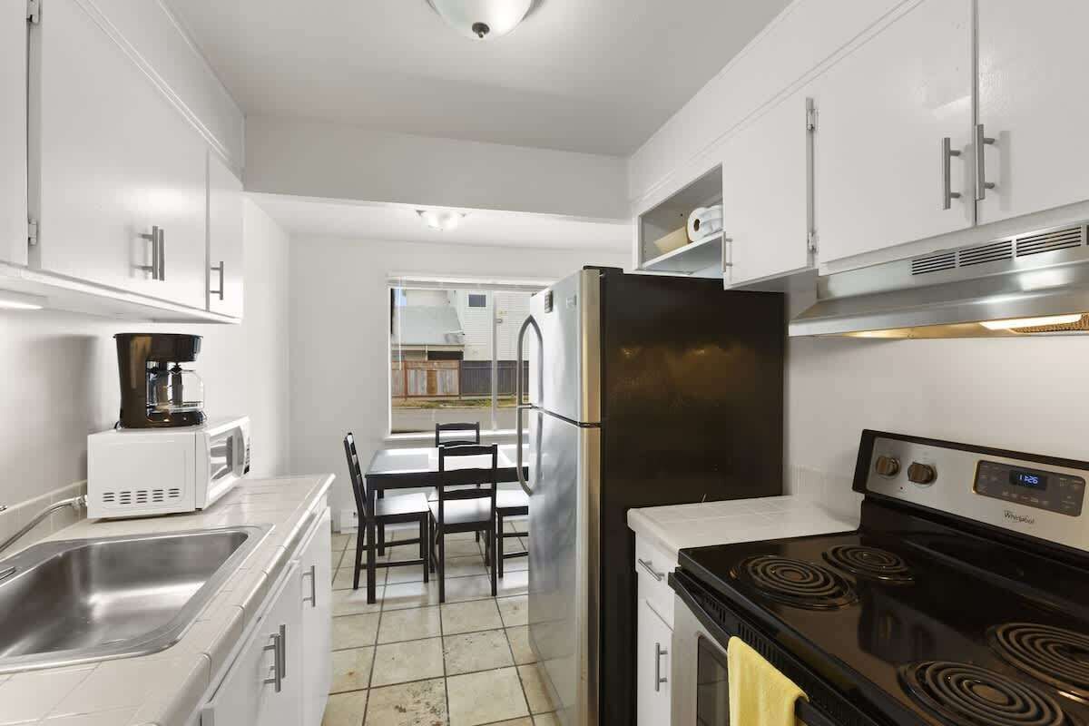 Fridge, microwave, oven, cookware/dishes/utensils