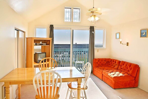 TV - Maris Stella Condo | Balcony & Kitchen | Unit E (Ocean Shores)