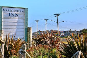 Property grounds - Maris Stella Condo | Balcony & Kitchen | Unit E (Ocean Shores)
