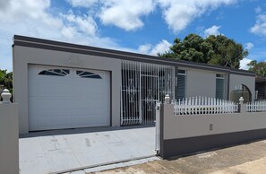 Exterior - Cozy 3BR Retreat • Minutes to Beaches + Ferry (Santa María)