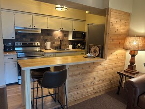 Fridge, microwave, oven, stovetop - Walk to Town! River Front Condo-1 King Bedroom-1 Bathroom (Estes Park)
