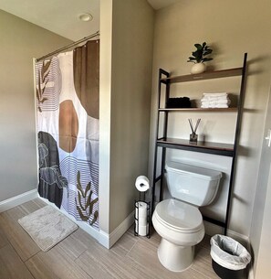 Jetted tub, hair dryer, towels, soap