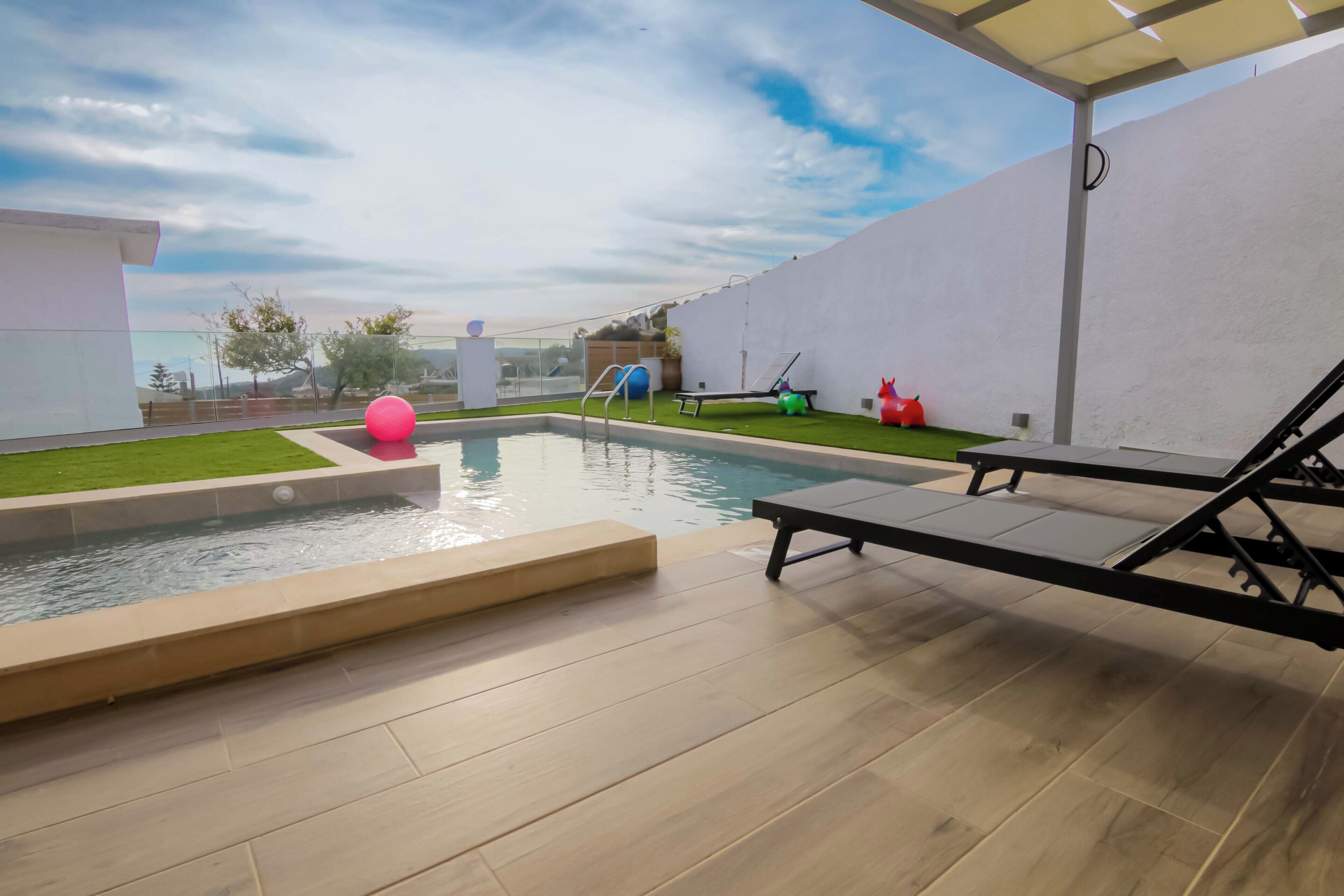 Seasonal outdoor pool, open 9:00 AM to 9:00 PM, sun loungers