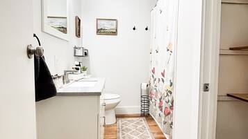 Hair dryer, towels, soap, shampoo