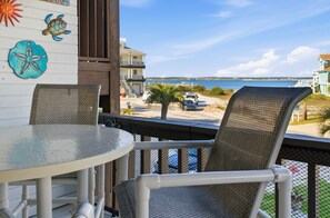 Outdoor dining - Steps to Sand • Sound Views • Sugar Dunes 211 (Navarre Beach)