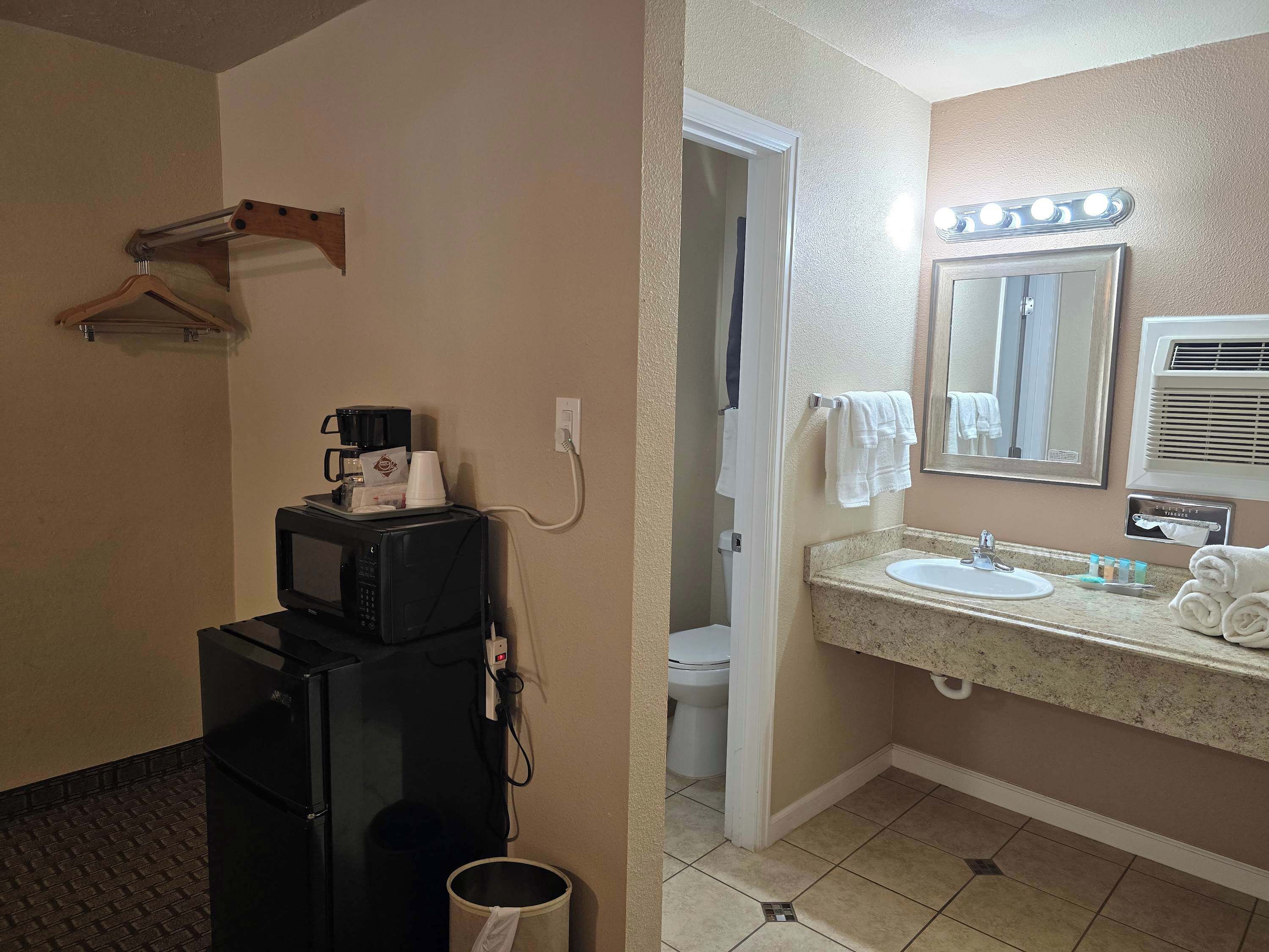 Shower, hair dryer, towels, shampoo